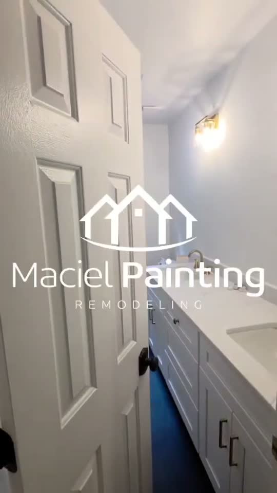 Finished bathroom repaint with clean white trim, Marietta